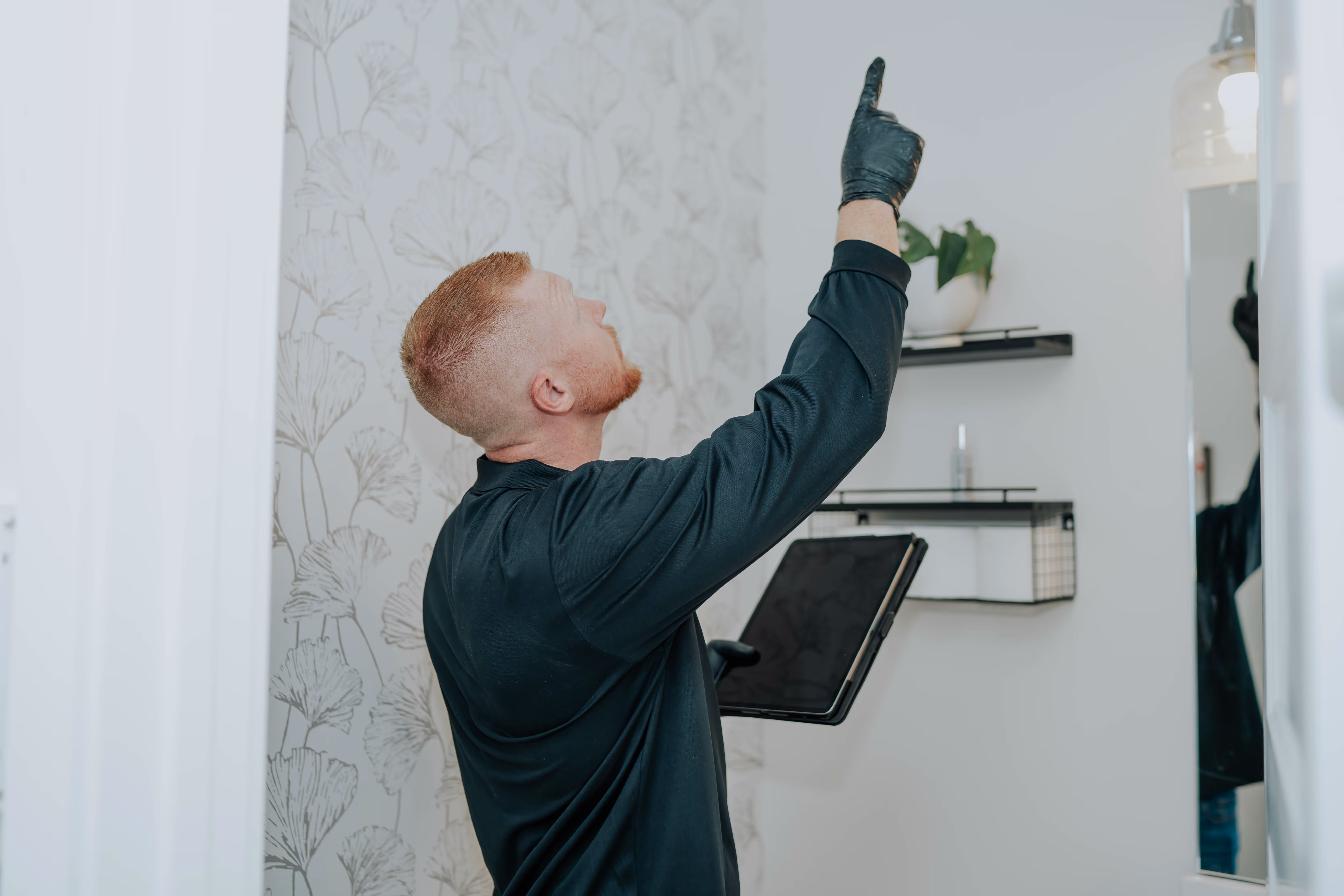 Lone Star Pure Maintenance specialist inspecting a property
